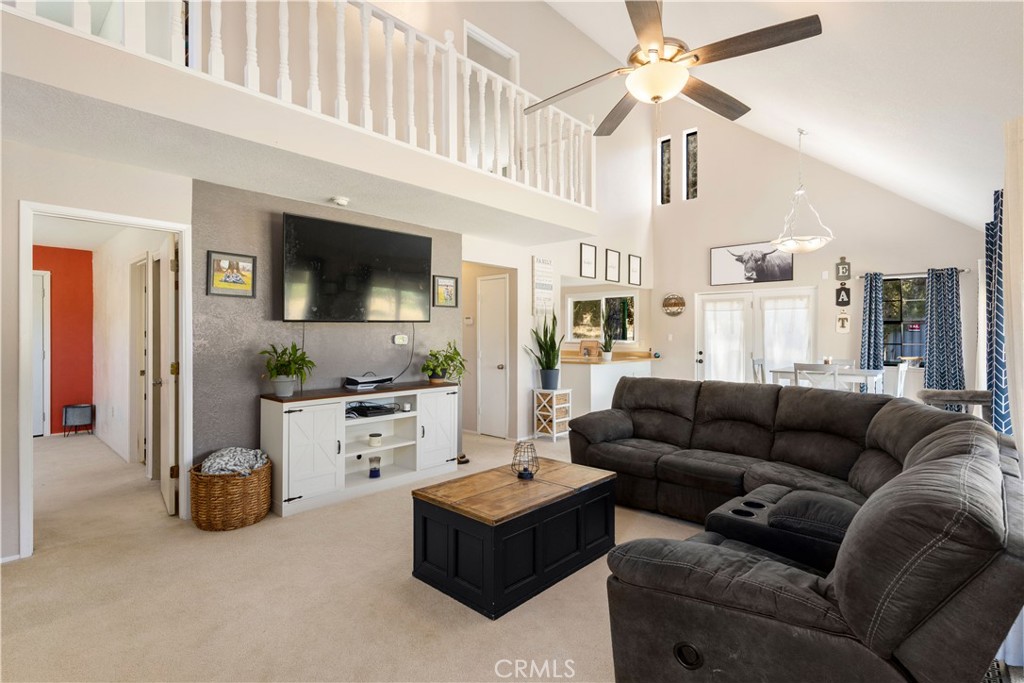 2225 Ladder Ridge Road Upper Lake, CA 95485 - Photo 10 of 58 a living room with furniture and a flat screen tv