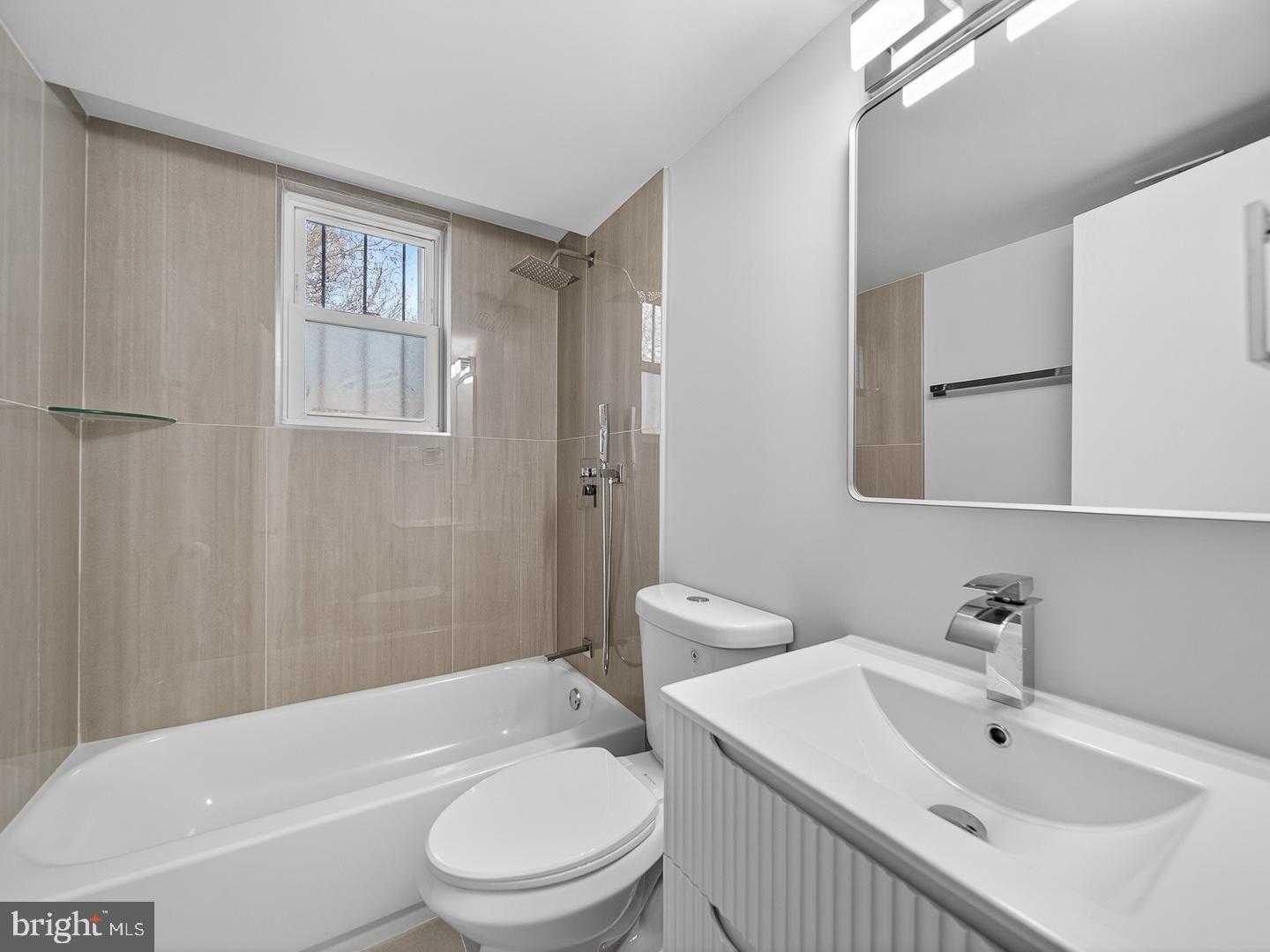 3108 P Street Southeast Washington, DC 20020 - Photo 25 of 34 Newly renovated bathroom with sleek finishes.