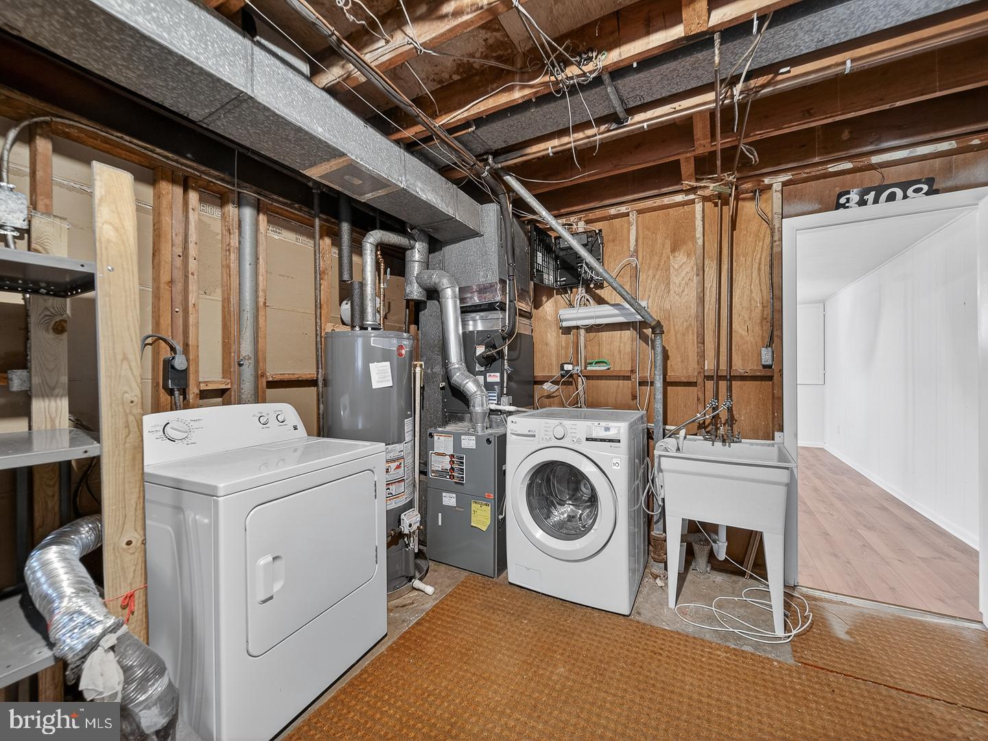 3108 P Street Southeast Washington, DC 20020 - Photo 30 of 34 Functional laundry space with utility features.
