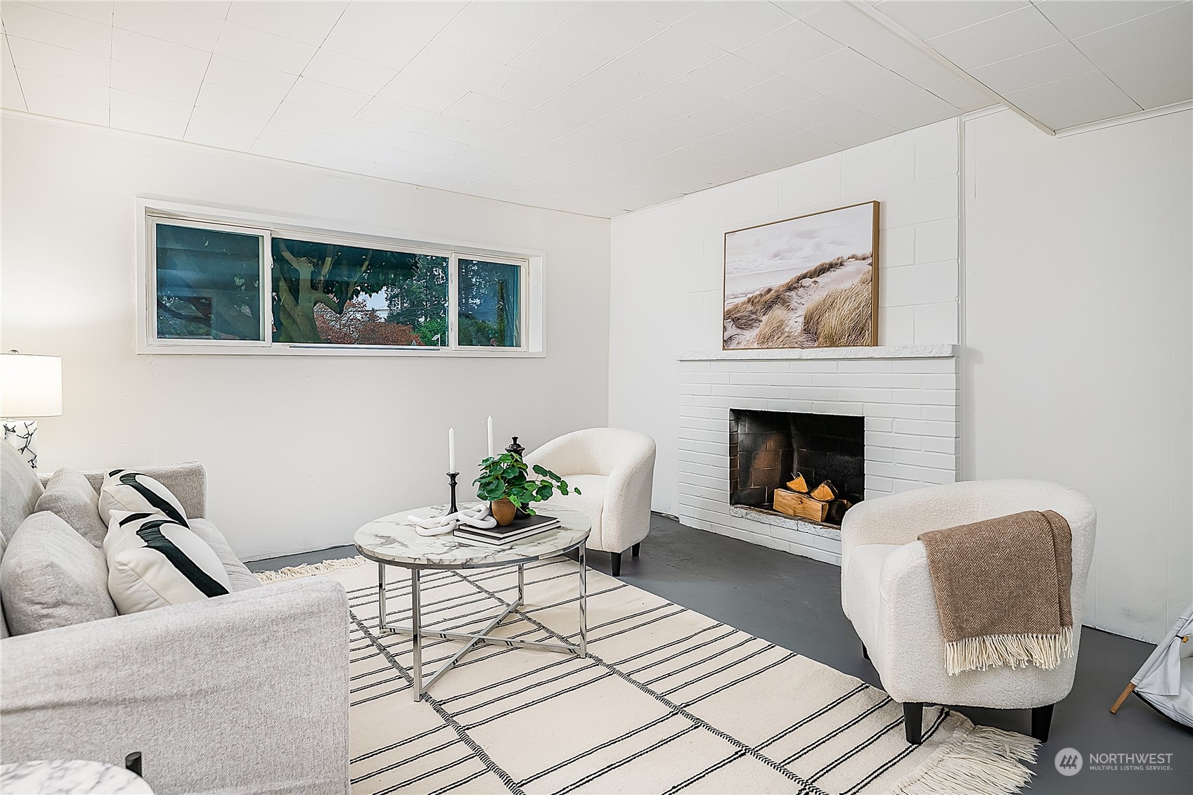 5 234th Place Southeast Bothell, WA 98021 - Photo 12 of 22 a living room with furniture and a fireplace