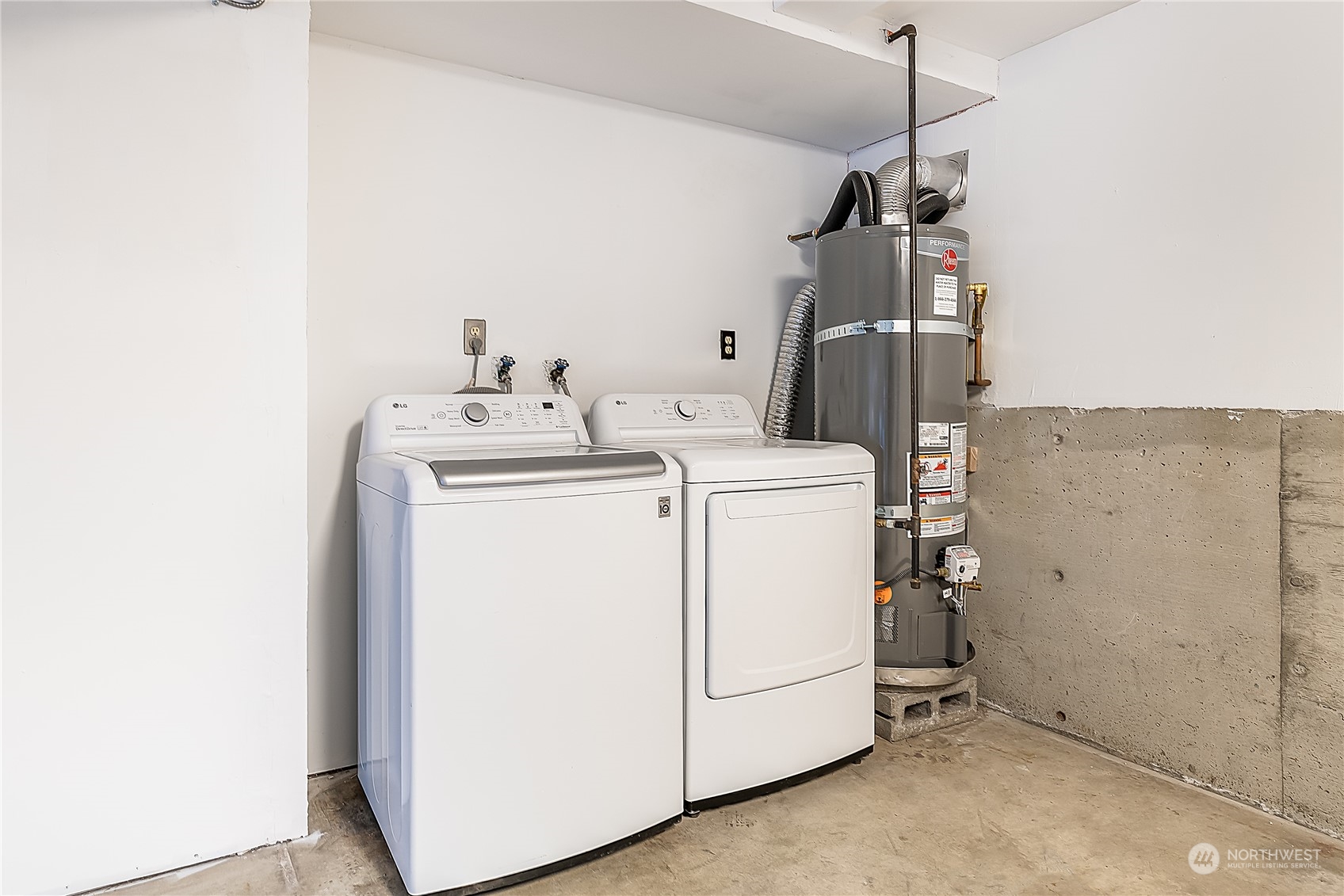 5 234th Place Southeast Bothell, WA 98021 - Photo 21 of 22 a utility room with dryer and washer