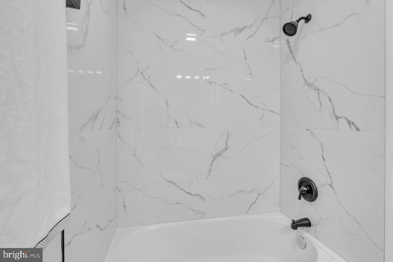 201 Timber Creek Road Lindenwold, NJ 08021 - Photo 15 of 38 a bathroom with a bathtub and shower