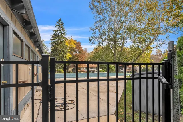 a view of a balcony with a tree