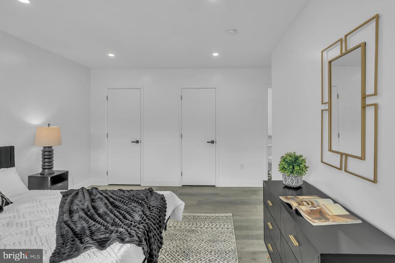 201 Timber Creek Road Lindenwold, NJ 08021 - Photo 2 of 38 a bedroom with a bed and a dresser