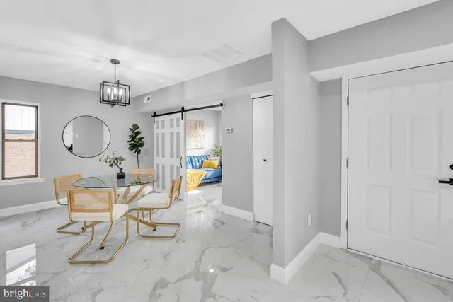 a view of a livingroom with furniture