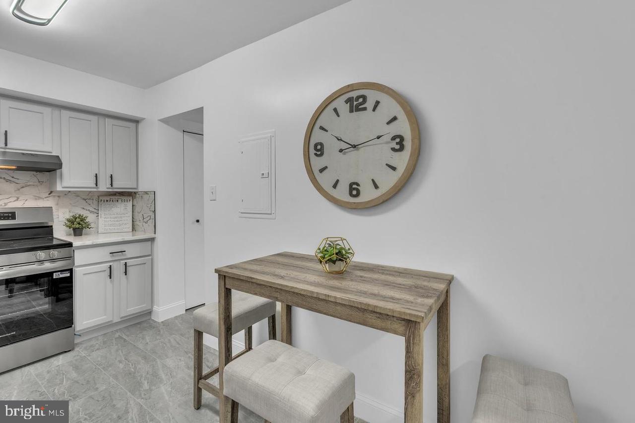 201 Timber Creek Road Lindenwold, NJ 08021 - Photo 35 of 38 a view of a kitchen with a sink a stove top oven