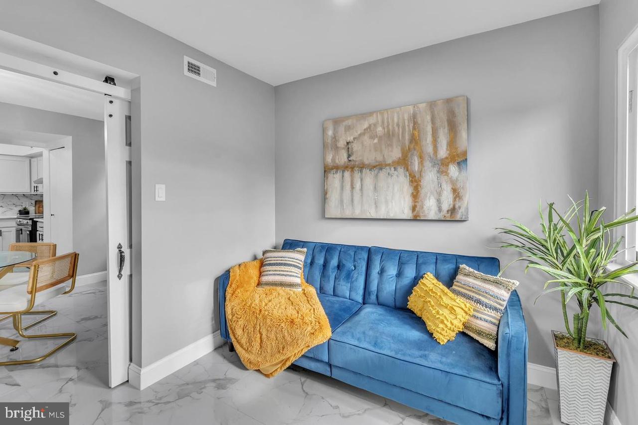 201 Timber Creek Road Lindenwold, NJ 08021 - Photo 38 of 38 a living room with furniture and wooden floor