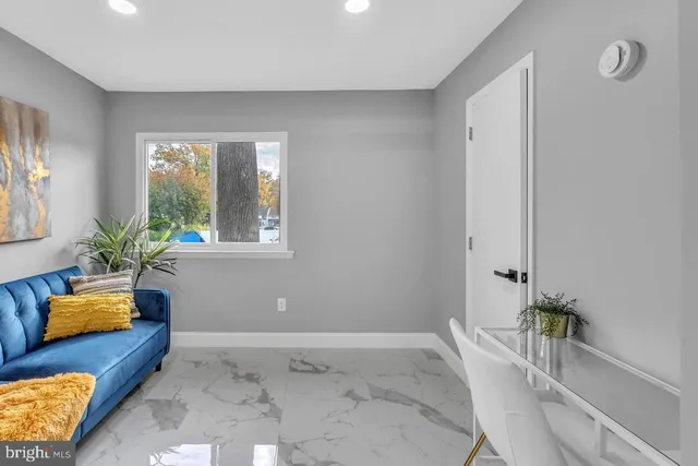 a bathroom with a tub shower and window