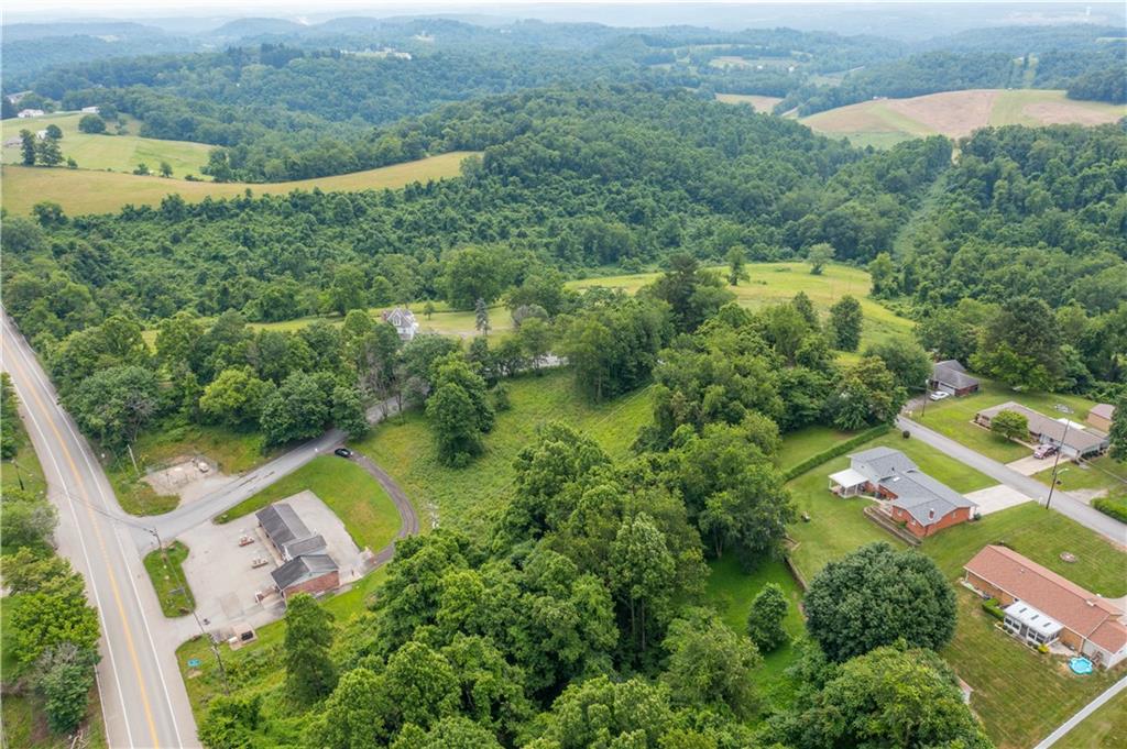 0 Emery Road Fredericktown, PA 15333 - Photo 5 of 8 an aerial view of residential houses with outdoor space and trees