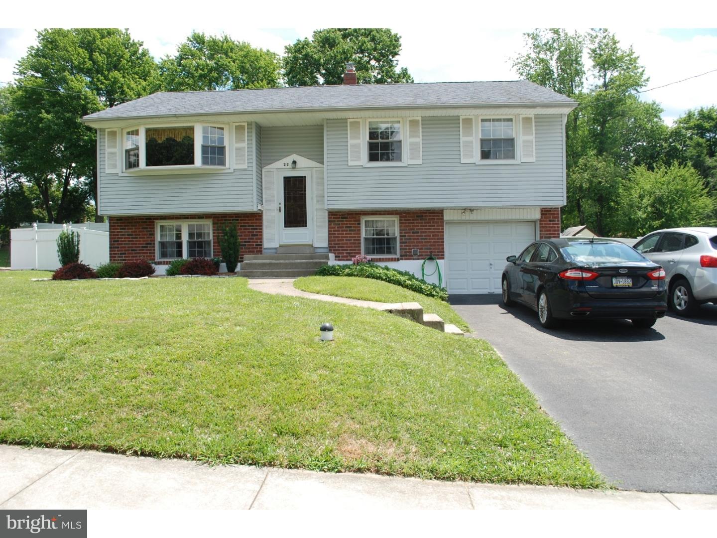22 Hearthside Road Aston, PA 19014 - Photo 1 of 22 a house view with a garden space