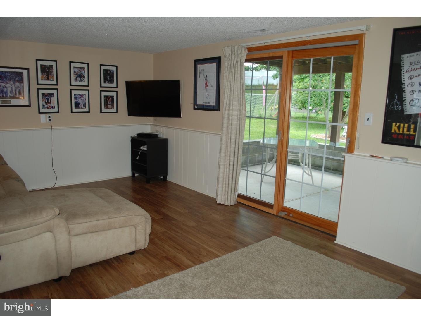 22 Hearthside Road Aston, PA 19014 - Photo 13 of 22 a living room with furniture and a flat screen tv