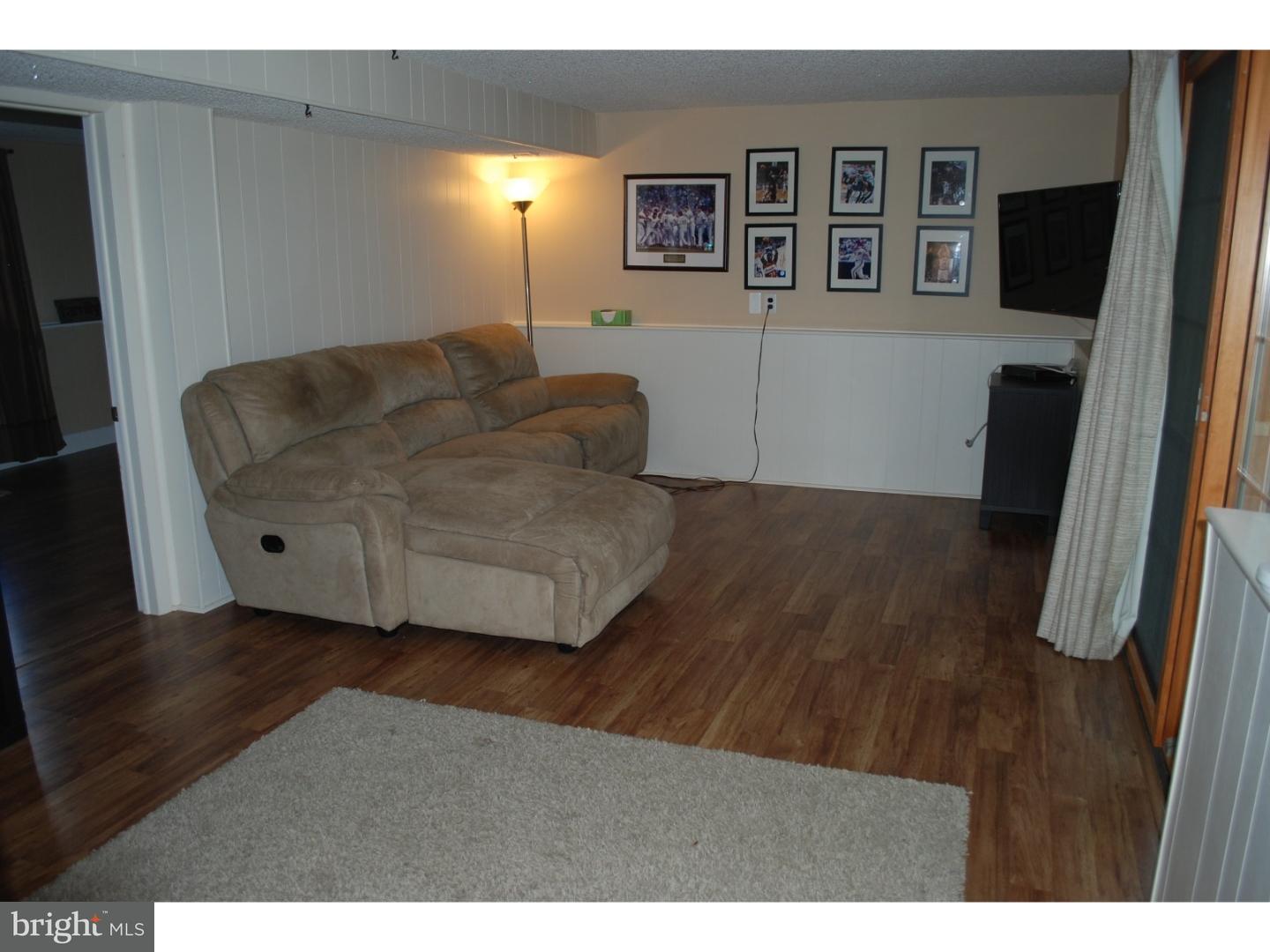 22 Hearthside Road Aston, PA 19014 - Photo 15 of 22 a living room with furniture and a flat screen tv