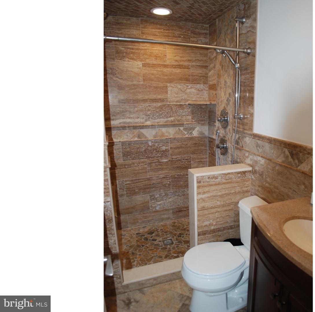 22 Hearthside Road Aston, PA 19014 - Photo 17 of 22 a bathroom with a toilet and a shower