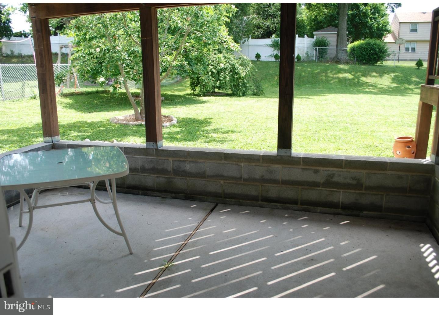 22 Hearthside Road Aston, PA 19014 - Photo 19 of 22 a room view with a floor to ceiling window and a yard