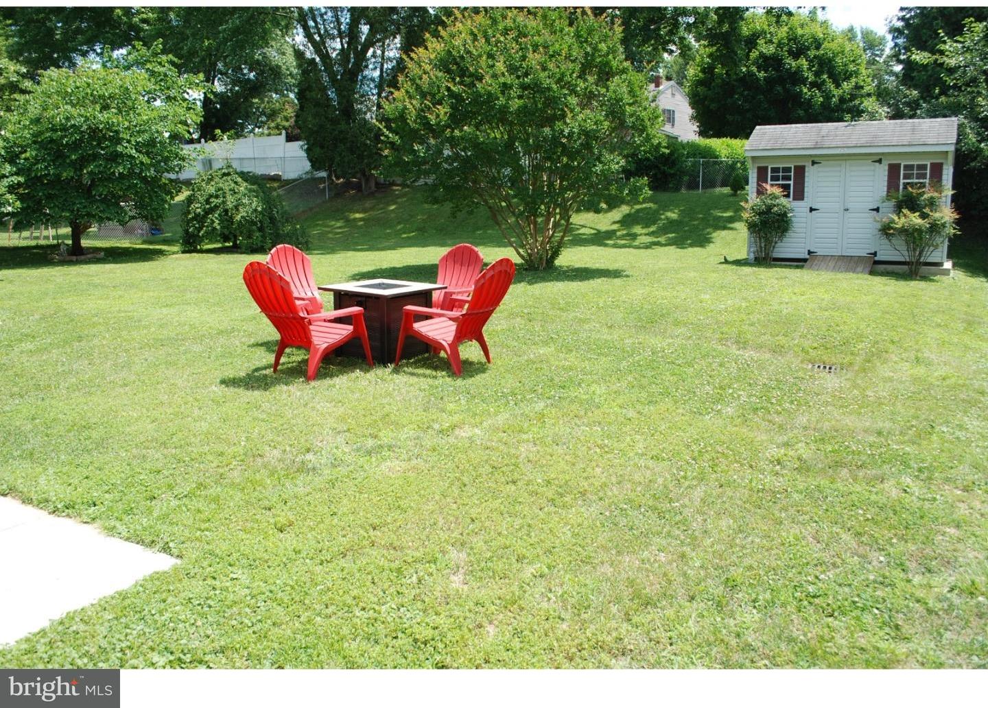 22 Hearthside Road Aston, PA 19014 - Photo 20 of 22 a view of a house with backyard sitting area and garden