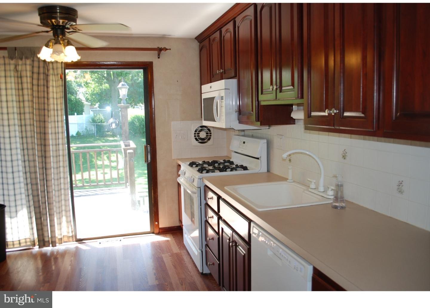 22 Hearthside Road Aston, PA 19014 - Photo 5 of 22 a kitchen with a sink cabinets and window