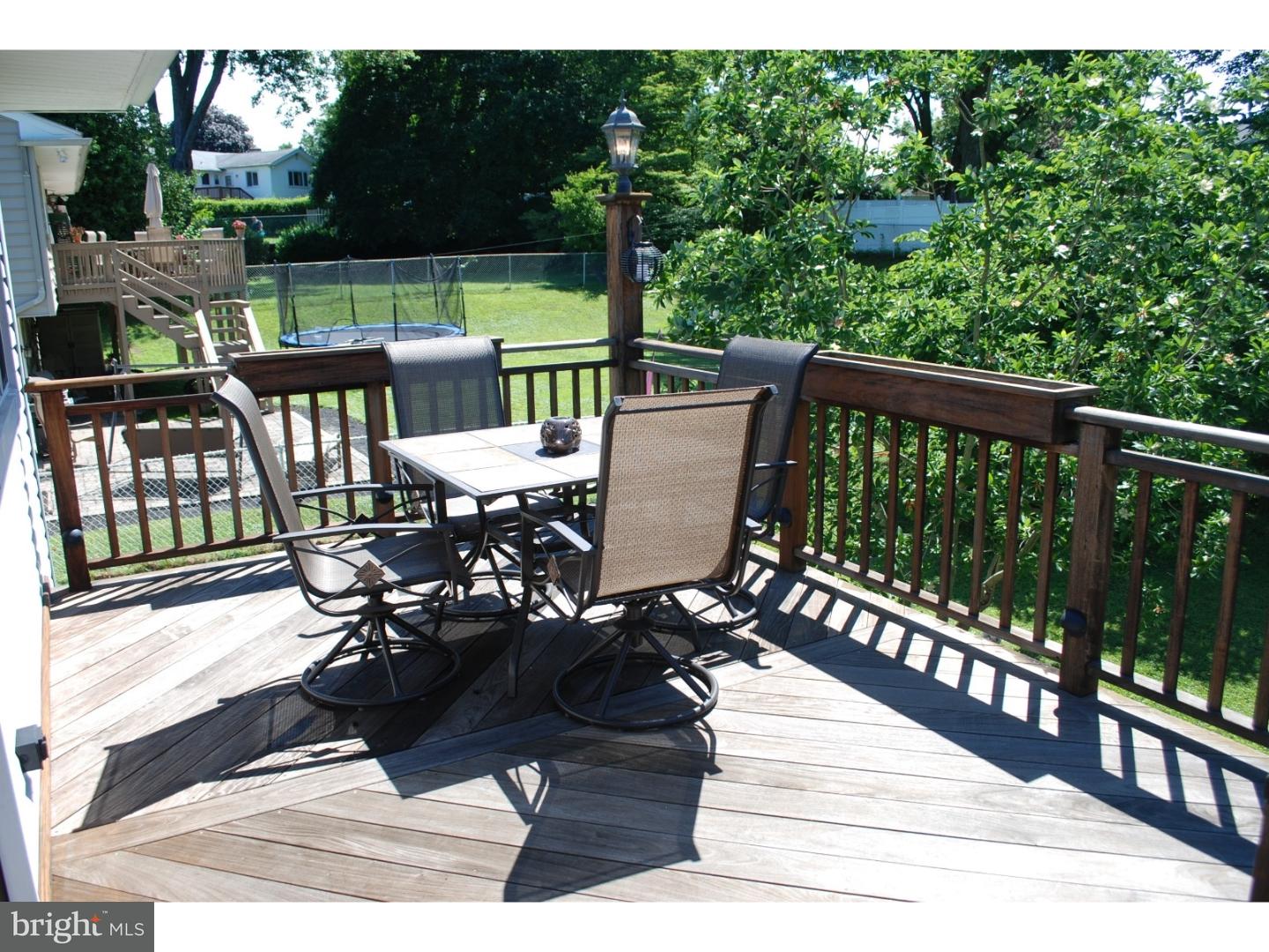 22 Hearthside Road Aston, PA 19014 - Photo 7 of 22 a view of a balcony with chairs and wooden floor