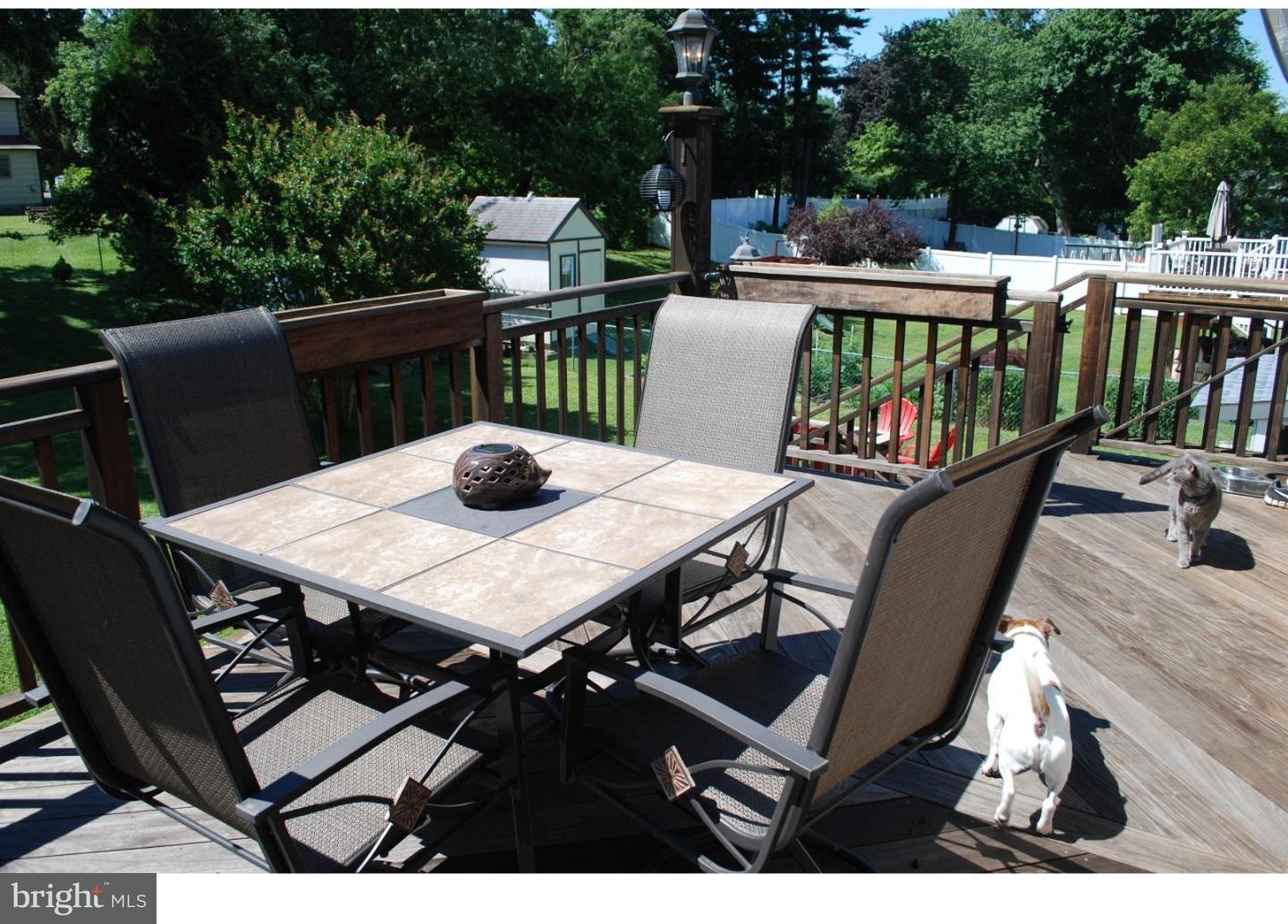 22 Hearthside Road Aston, PA 19014 - Photo 8 of 22 a view of a dinning tables and chairs in patio