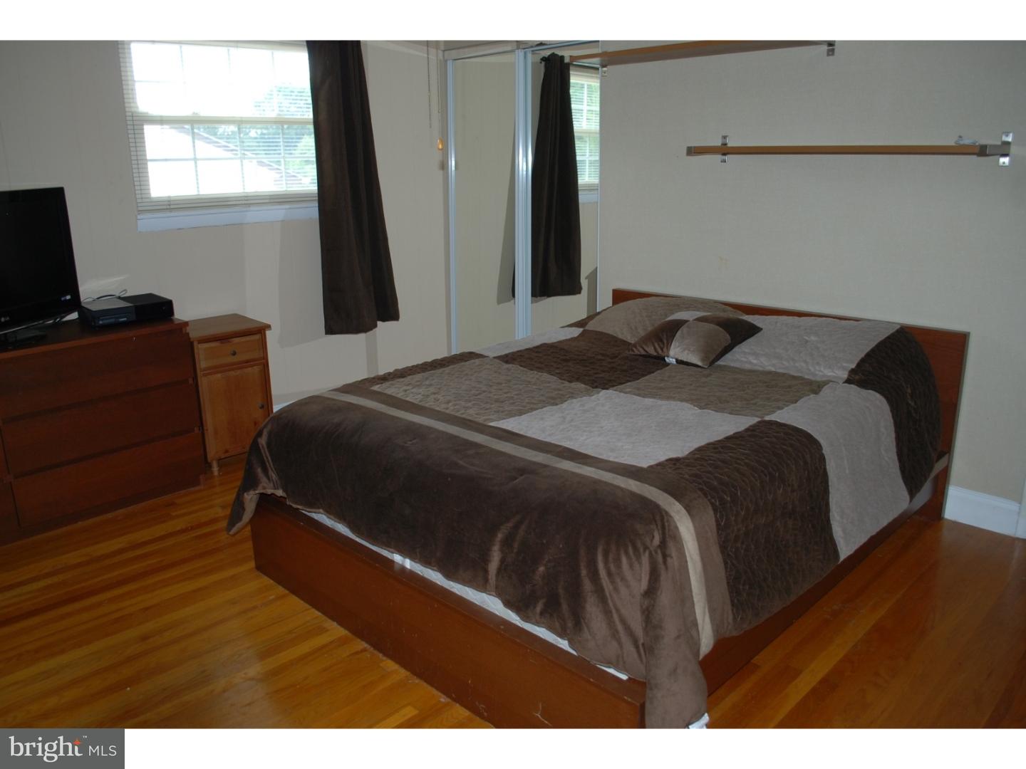22 Hearthside Road Aston, PA 19014 - Photo 9 of 22 a bedroom with a bed and a window