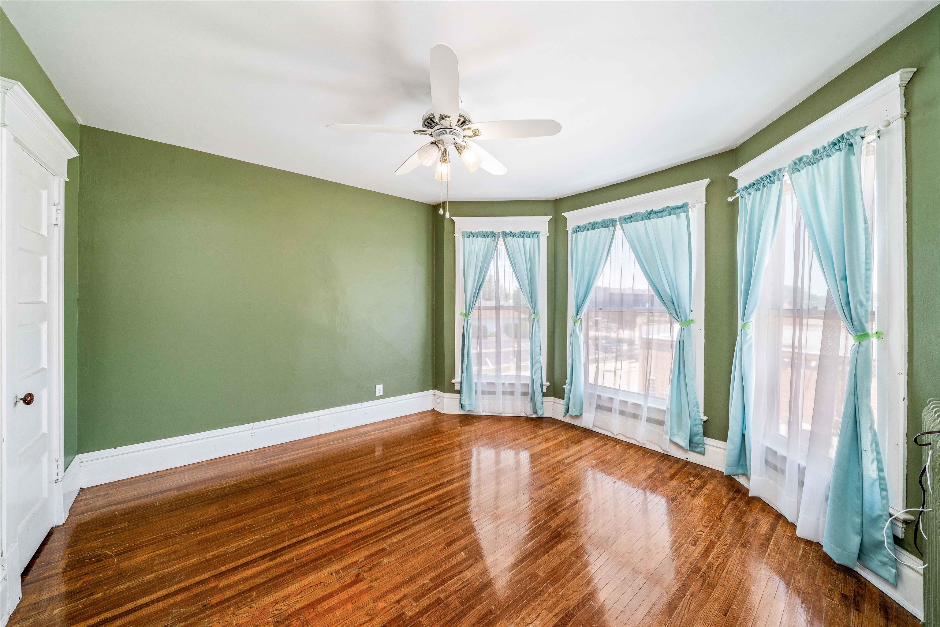111 South Sycamore Street Genoa, IL 60135 - Photo 6 of 22 a view of an empty room with a window