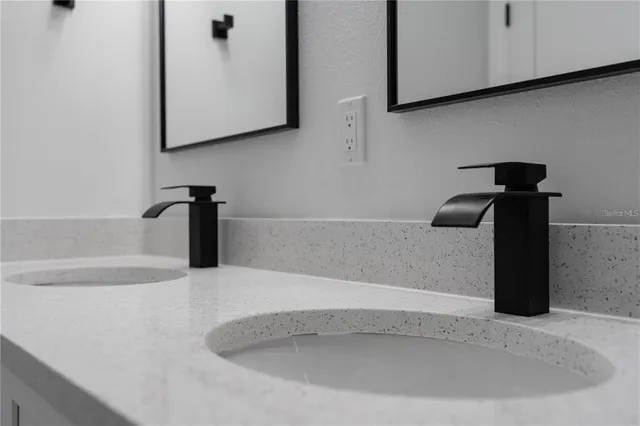 a view of an empty room with shelves