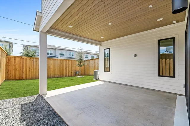 a bathroom with a bathtub and a sink