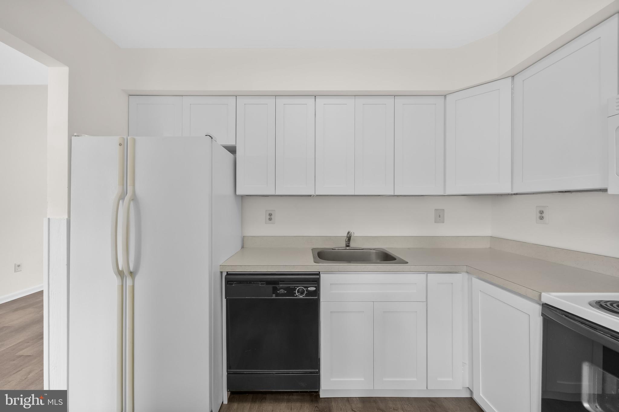 367 Barton Run Boulevard Marlton, NJ 08053 - Photo 13 of 24 a kitchen with stainless steel appliances white cabinets and a sink