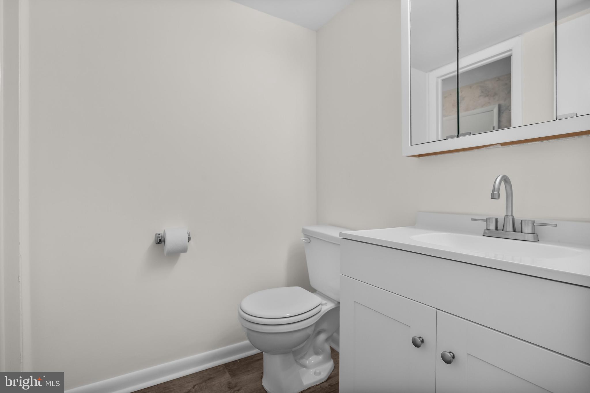 367 Barton Run Boulevard Marlton, NJ 08053 - Photo 20 of 24 a bathroom with a toilet a sink and mirror
