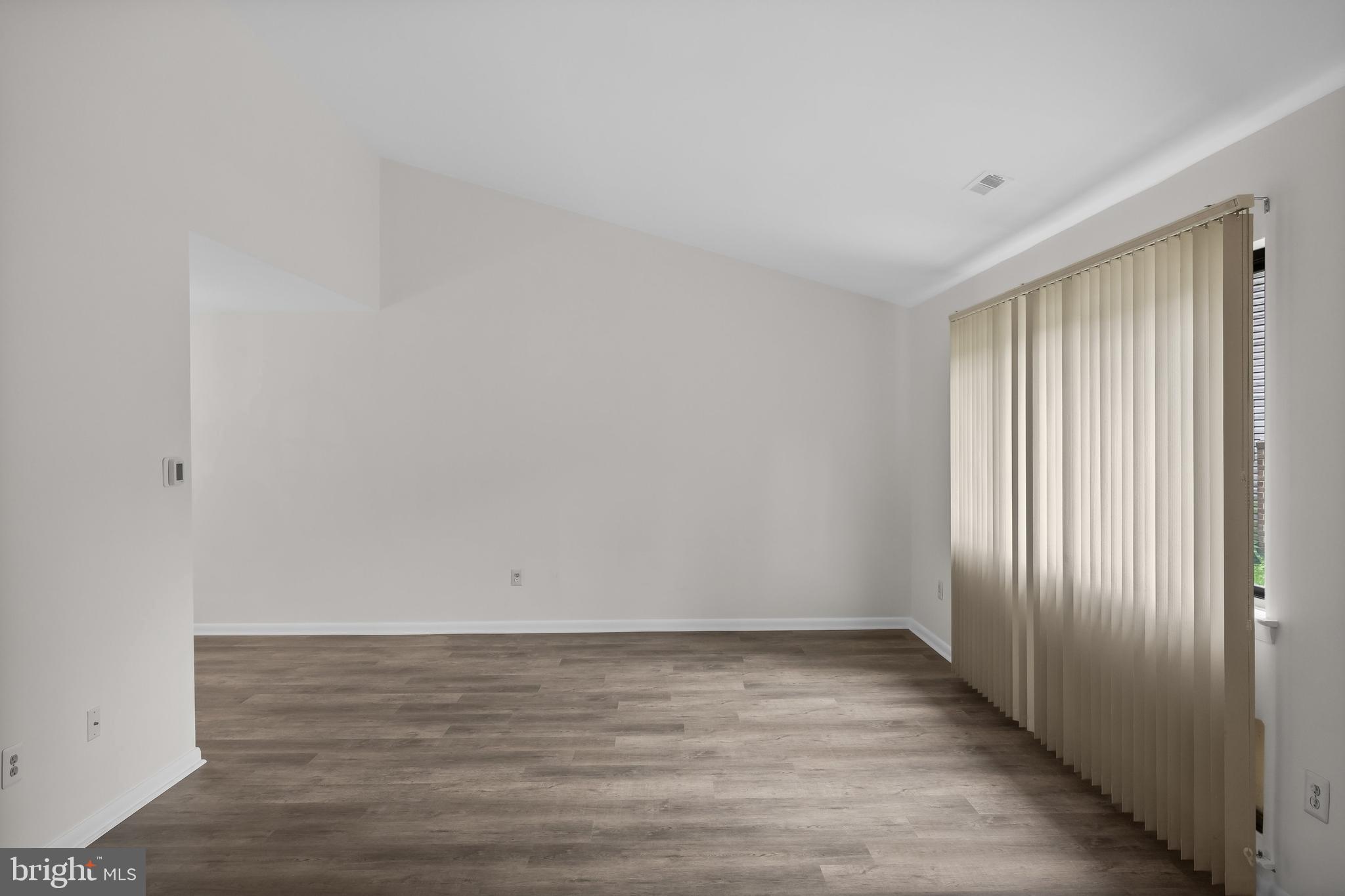 367 Barton Run Boulevard Marlton, NJ 08053 - Photo 4 of 24 a view of an empty room with wooden floor