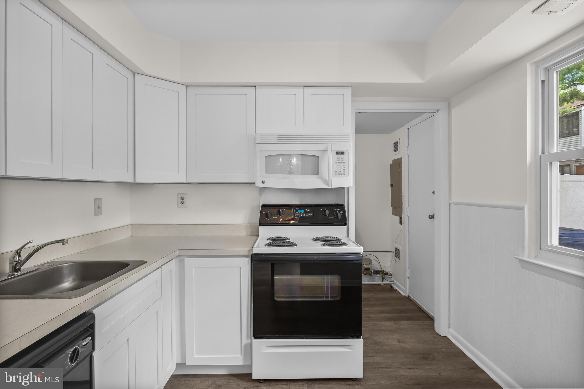 367 Barton Run Boulevard Marlton, NJ 08053 - Photo 10 of 24 a kitchen with white cabinets and stainless steel appliances