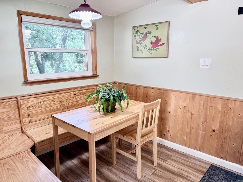 22292 Crestline Road Palomar Mountain, CA 92060 - Photo 8 of 38 a view of a dining room with furniture window and outside view