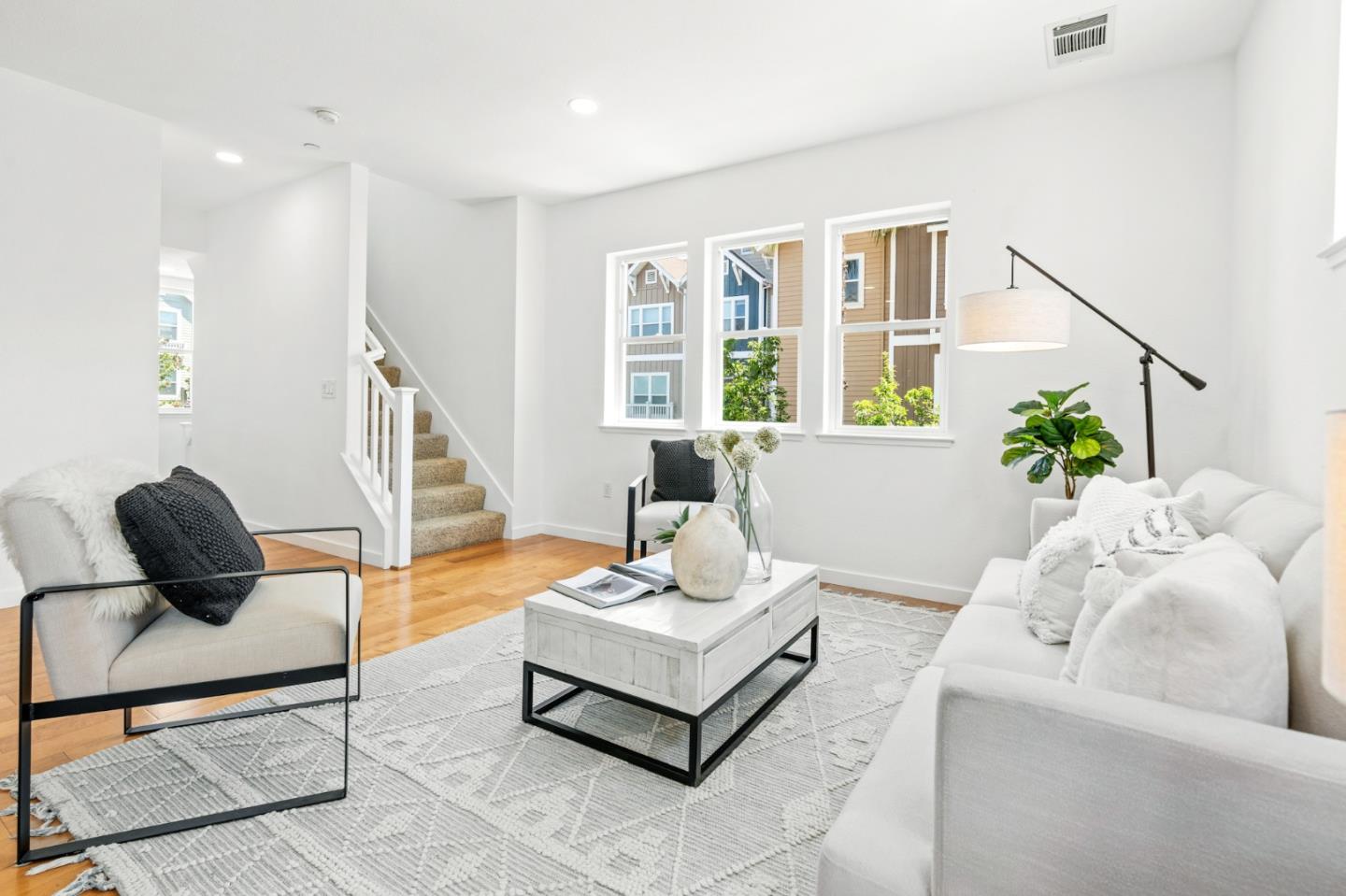 1909 Cambridge Drive Mountain View, CA 94043 - Photo 12 of 73 a living room with furniture and a potted plant