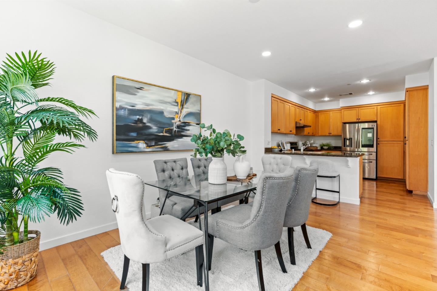 1909 Cambridge Drive Mountain View, CA 94043 - Photo 17 of 73 a dining room with furniture and wooden floor