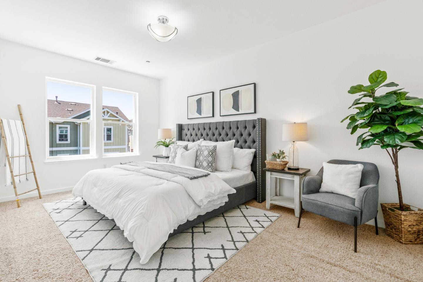 1909 Cambridge Drive Mountain View, CA 94043 - Photo 29 of 73 a bedroom with a bed and a potted plant
