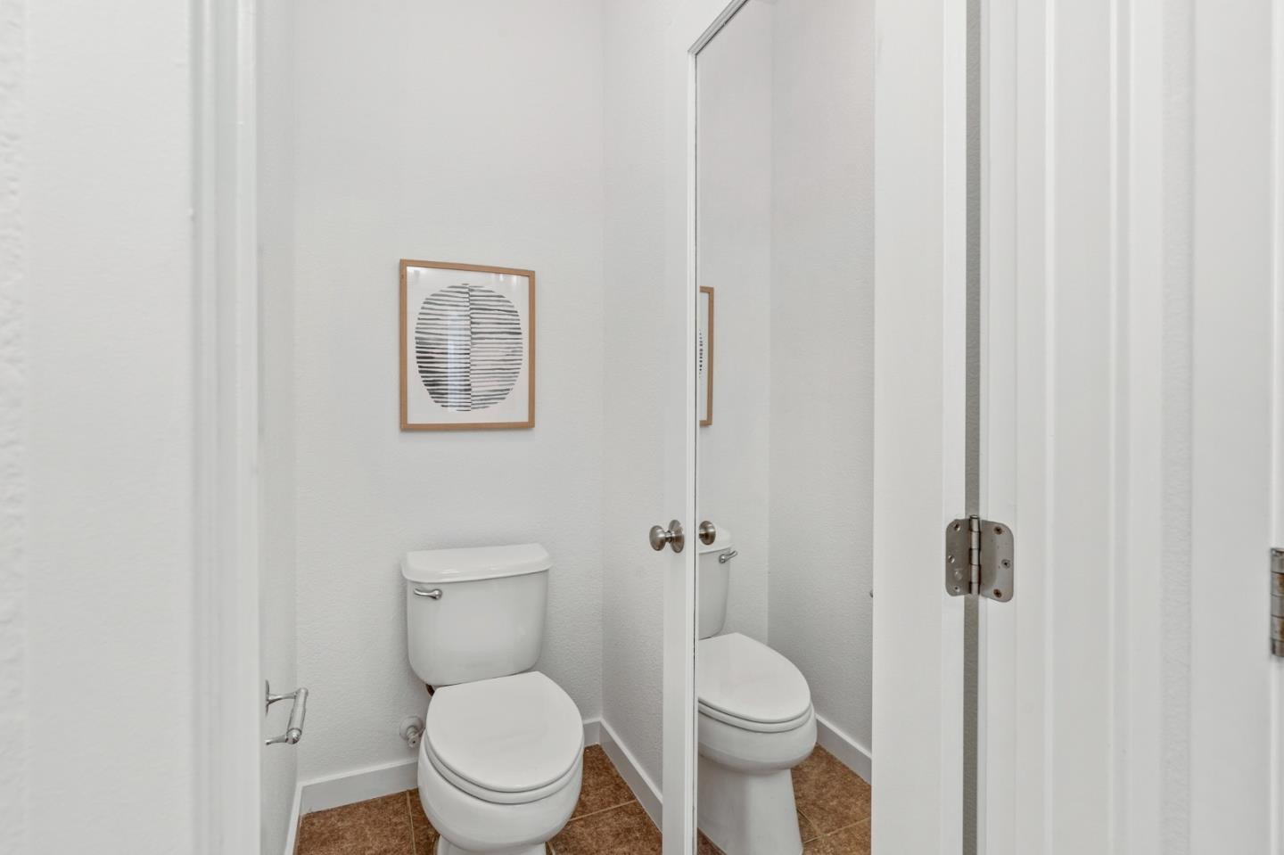 1909 Cambridge Drive Mountain View, CA 94043 - Photo 35 of 73 a white toilet sitting next to a shower