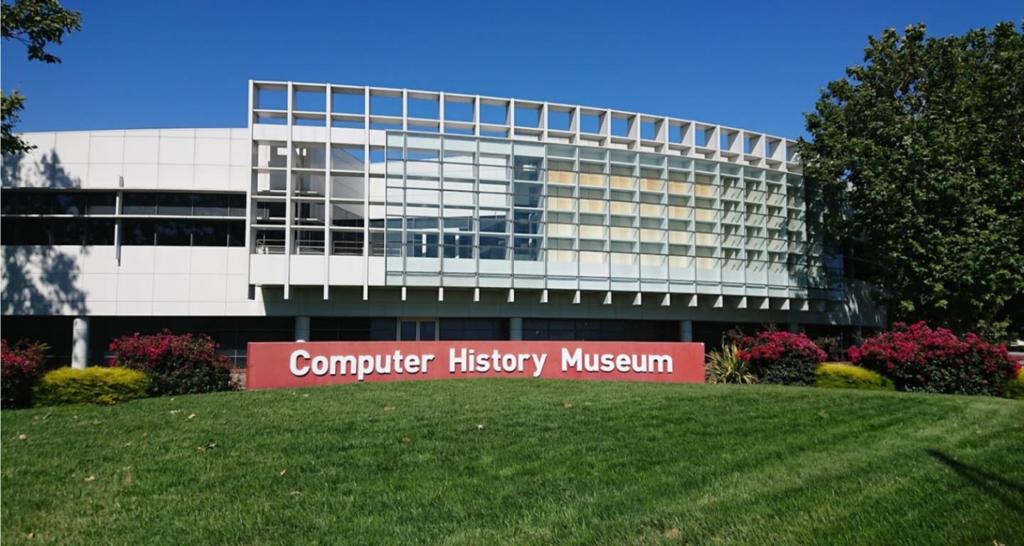1909 Cambridge Drive Mountain View, CA 94043 - Photo 65 of 73 a large building with a big yard and more windows