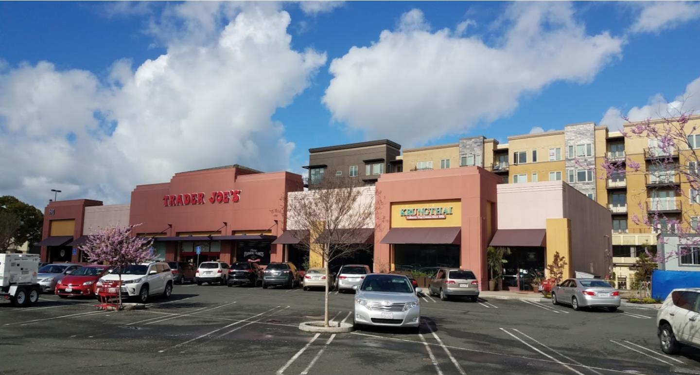 1909 Cambridge Drive Mountain View, CA 94043 - Photo 71 of 73 a building with glass windows and a street