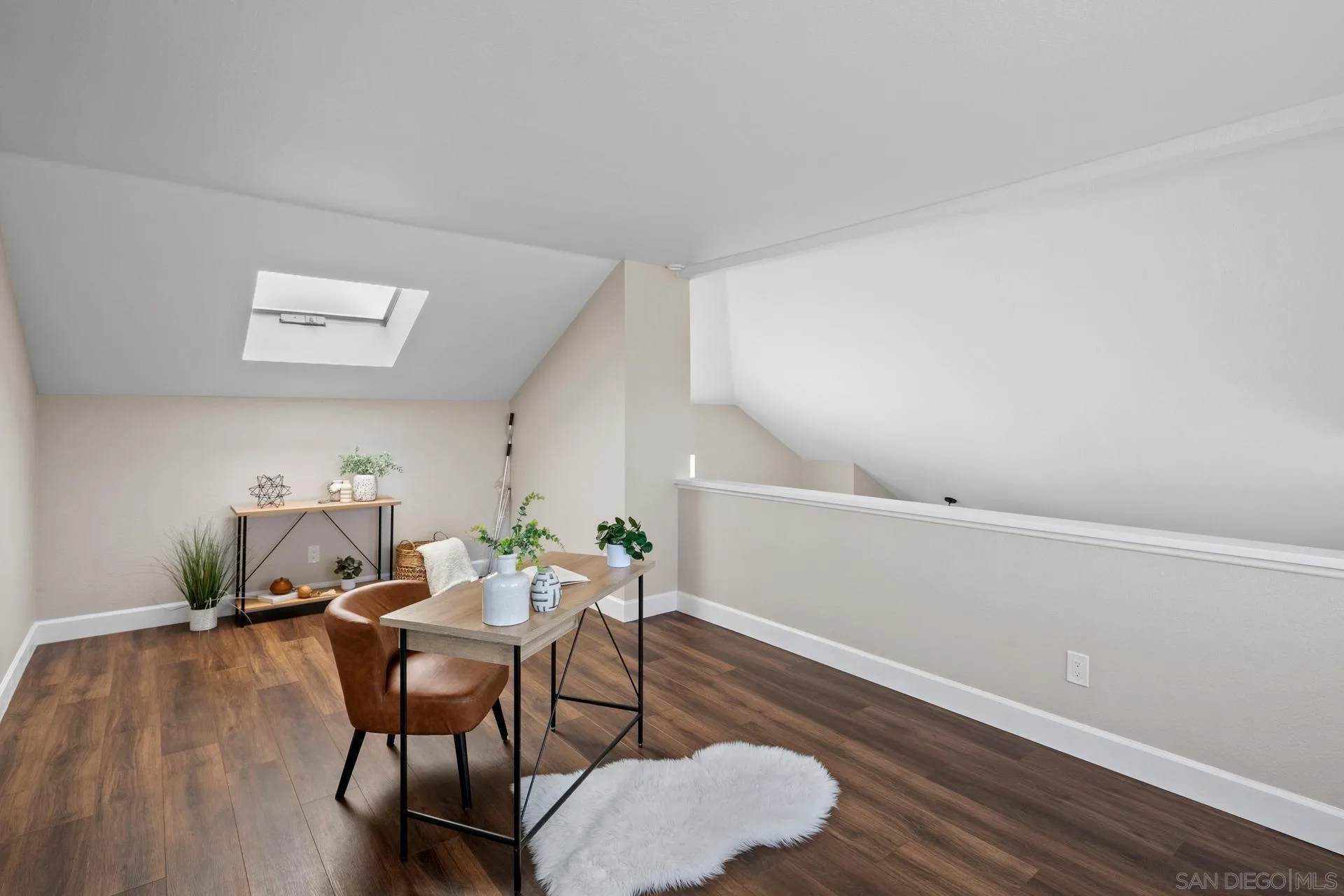 802 Spindrift Lane Carlsbad, CA 92011 - Photo 19 of 31 a view of a dining room with furniture and wooden floor