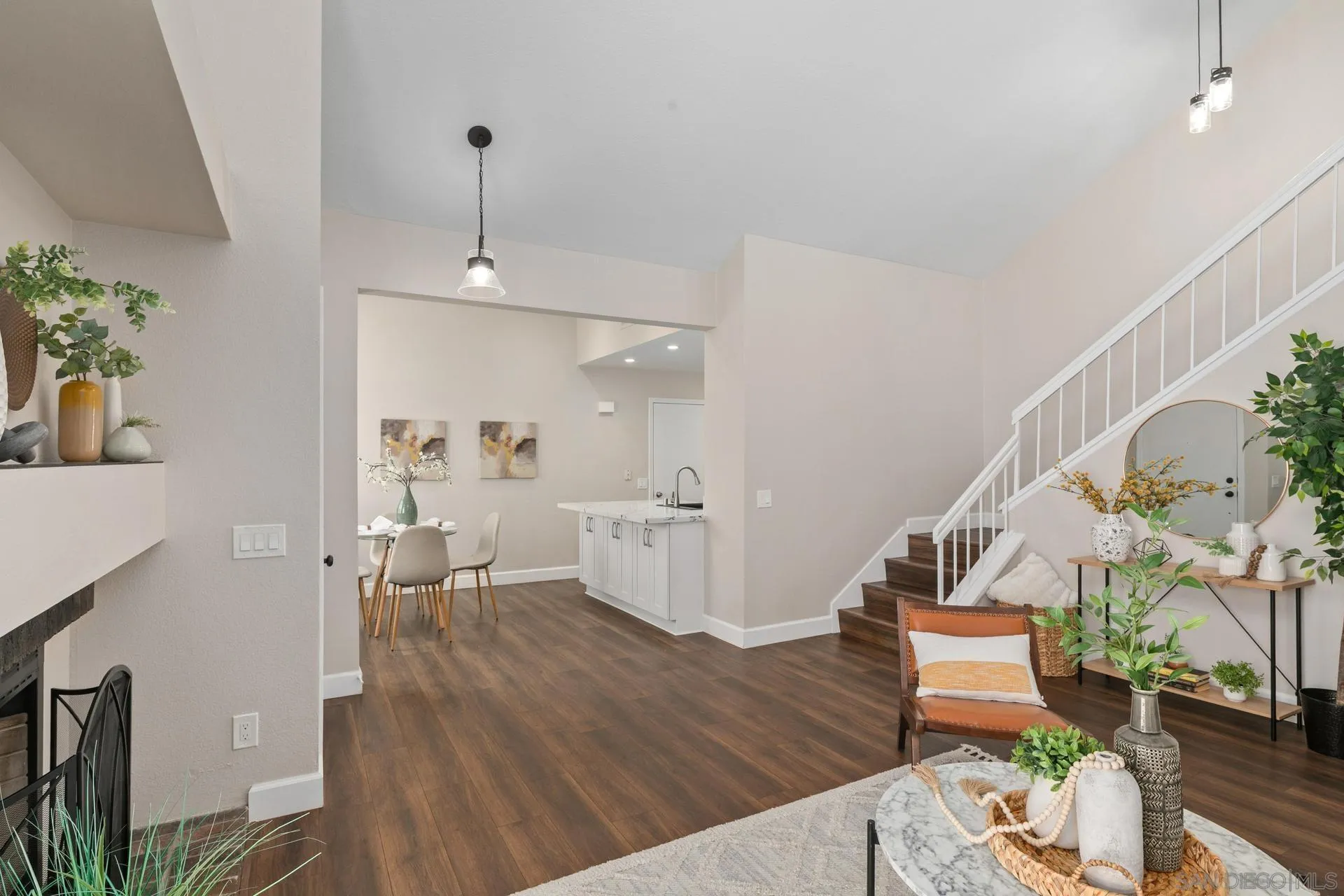 802 Spindrift Lane Carlsbad, CA 92011 - Photo 22 of 31 a living room with furniture and wooden floor