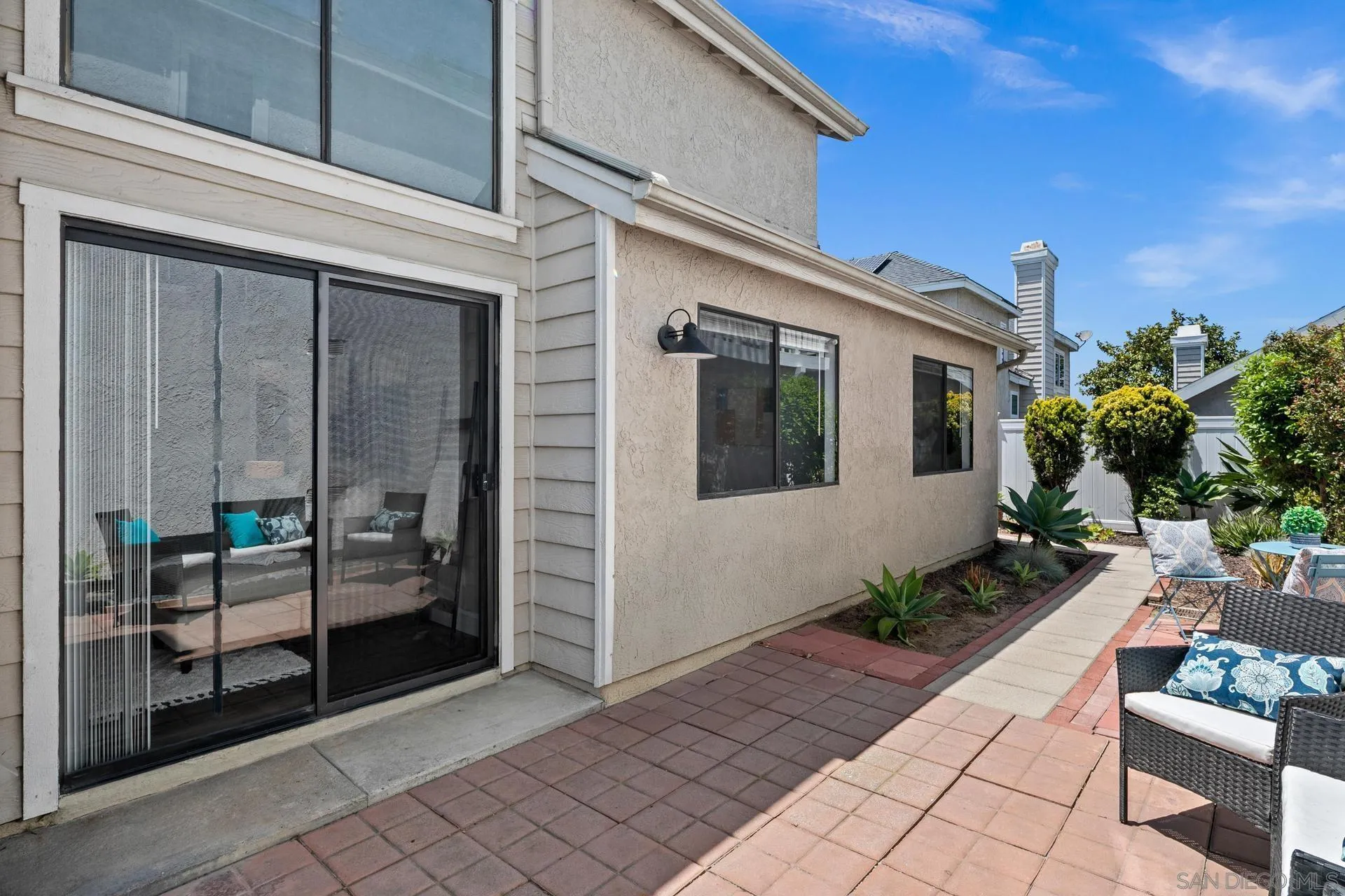 802 Spindrift Lane Carlsbad, CA 92011 - Photo 24 of 31 a view of house with patio outdoor seating space