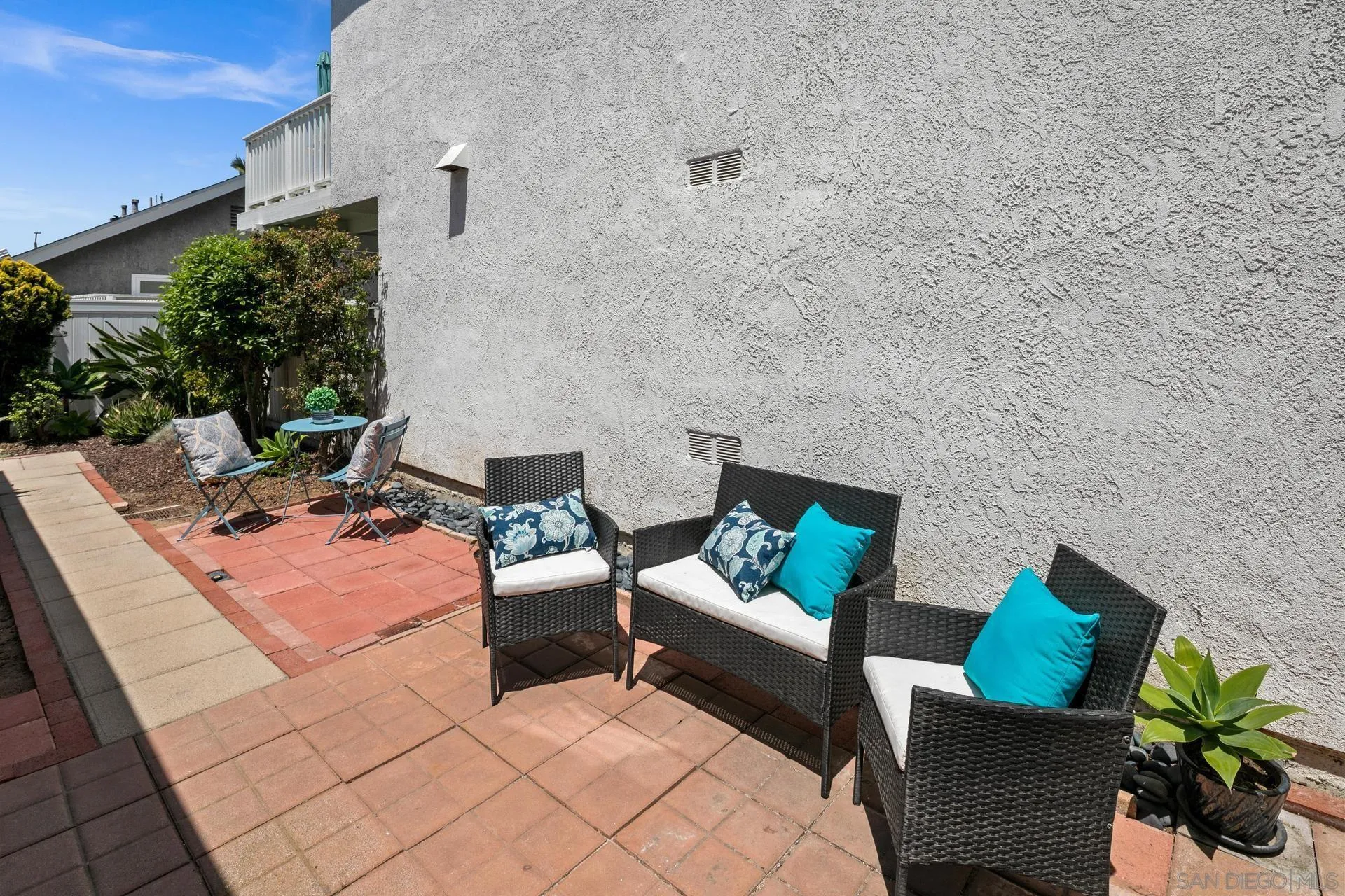 802 Spindrift Lane Carlsbad, CA 92011 - Photo 27 of 31 a outdoor living space with furniture and a fireplace