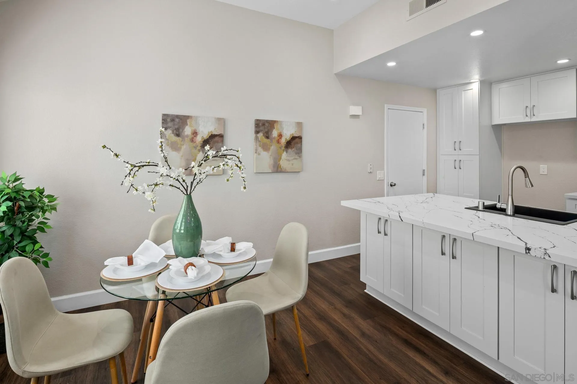 802 Spindrift Lane Carlsbad, CA 92011 - Photo 6 of 31 a view of a dining room with furniture window and flowerpot