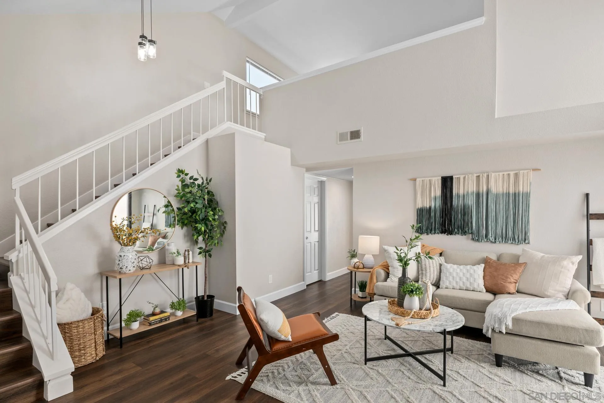 802 Spindrift Lane Carlsbad, CA 92011 - Photo 9 of 31 a living room with furniture and wooden floor