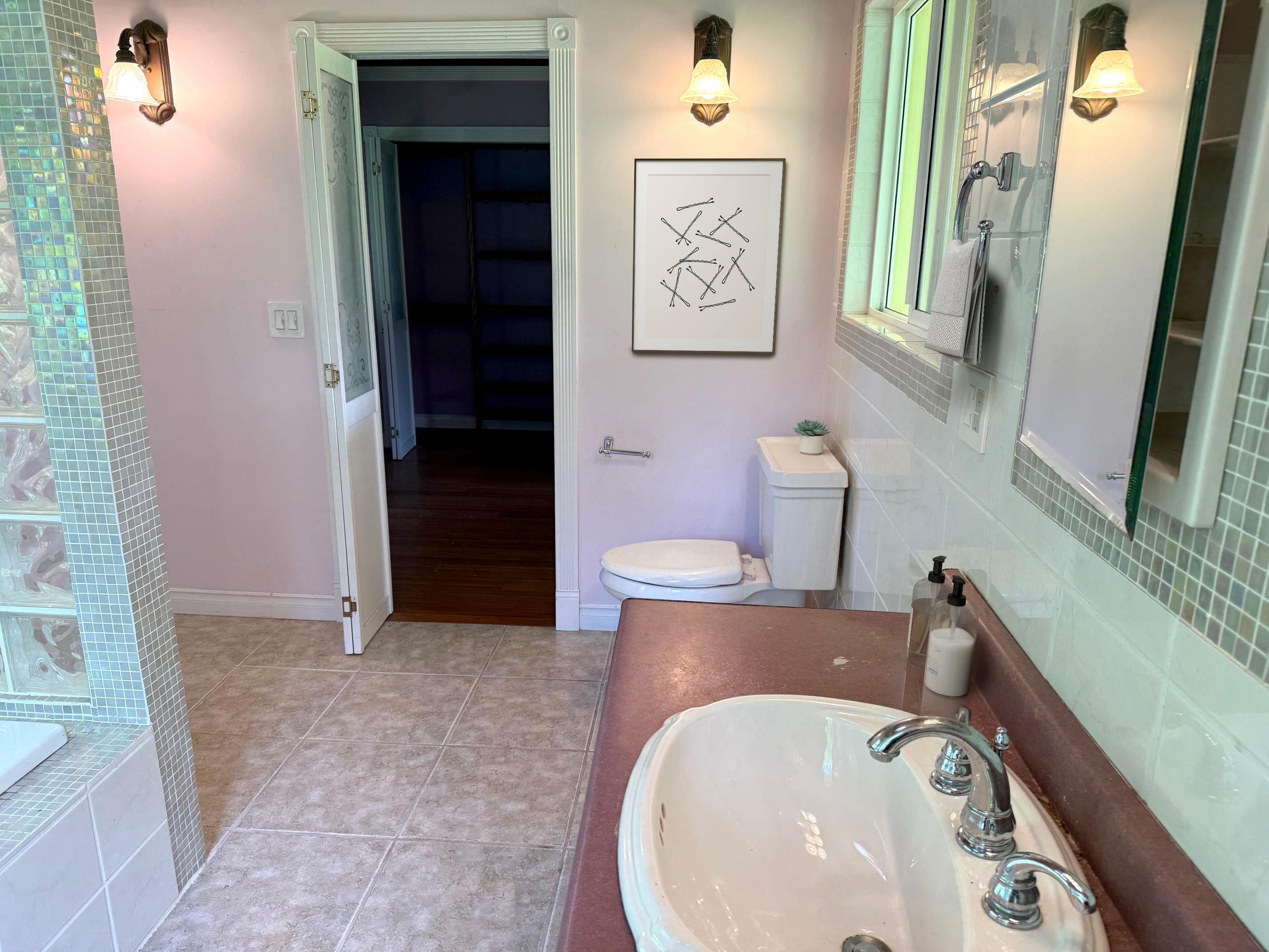 241 Ulaino Road Hana, HI 96713 - Photo 13 of 32 a bathroom with a sink and a mirror