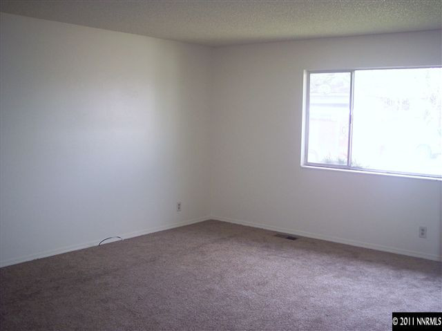 1910 Prince Way Reno, NV 89503 - Photo 2 of 13 an empty room with a window
