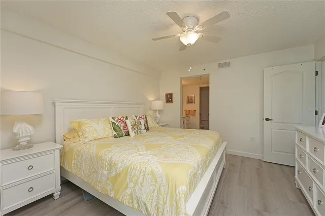 a view of a patio with couches and pool
