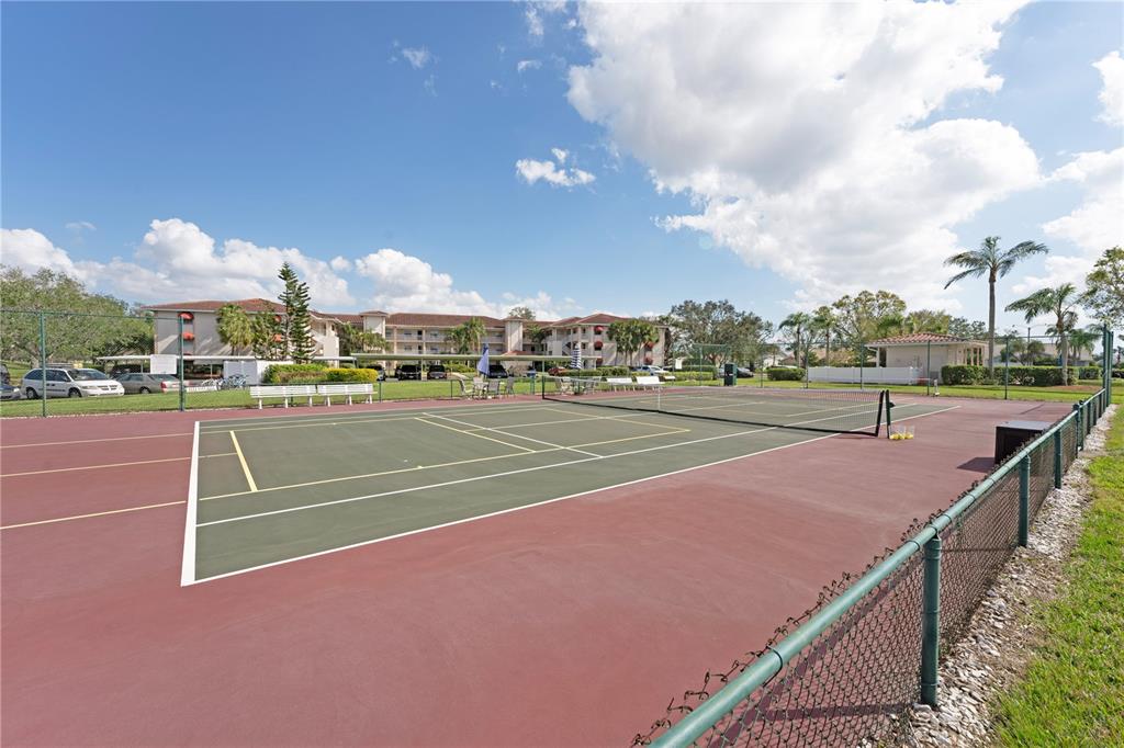 6501 Stone River Road, Unit 205 Bradenton, FL 34203 - Photo 26 of 50 a view of a tennis court