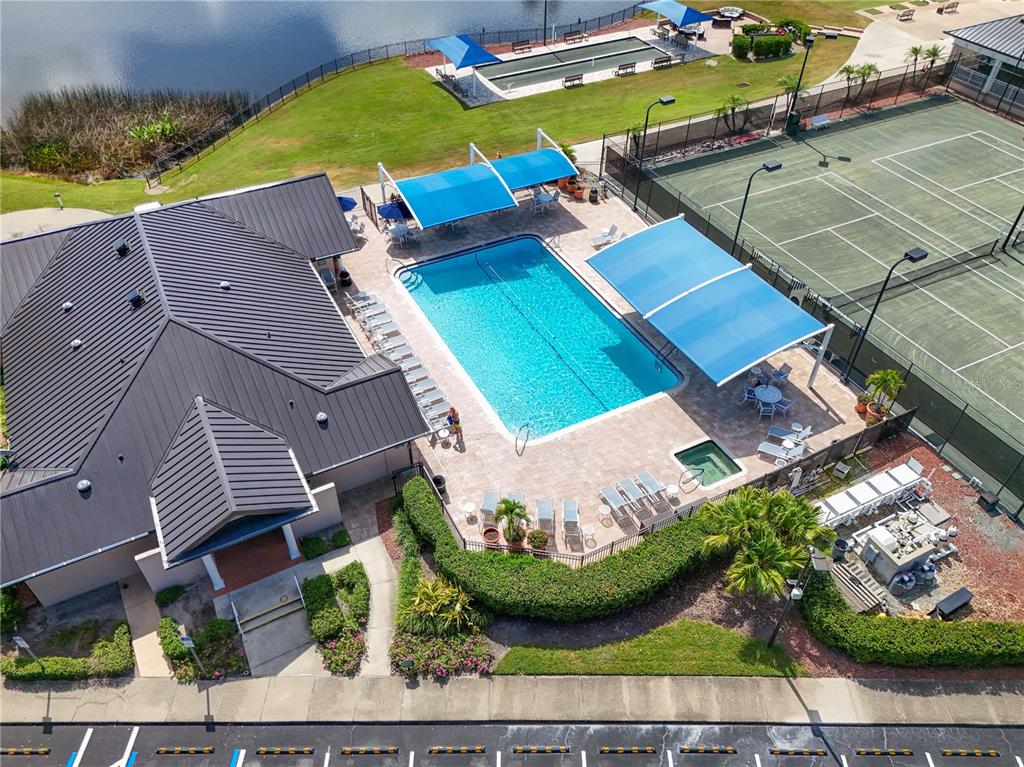 6501 Stone River Road, Unit 205 Bradenton, FL 34203 - Photo 46 of 50 an aerial view of a house with a garden and lake view
