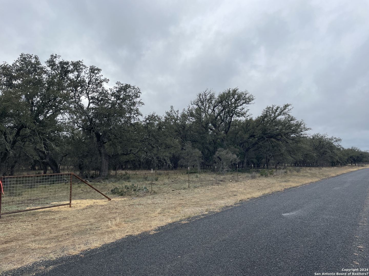 0 County Road 311 D'Hanis, TX 78850 - Photo 2 of 10 a view of a swimming pool with a yard