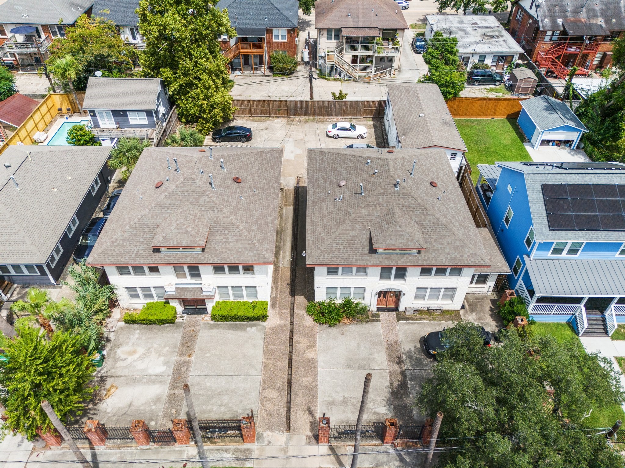 918-920 Peden Street Houston, TX 77006 - Photo 3 of 13 an aerial view of residential houses with outdoor space and swimming pool